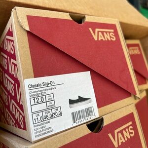 Vans black classic slip on